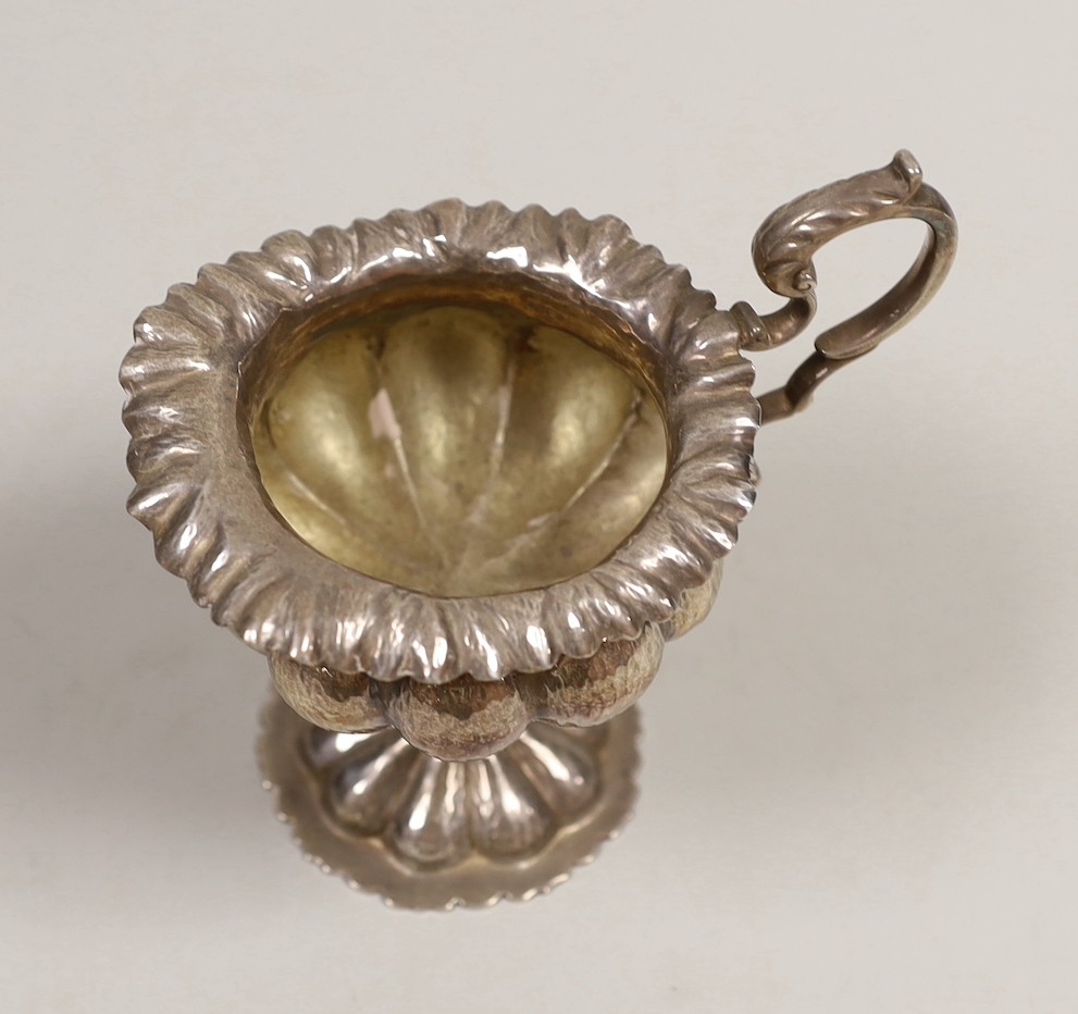 An Edwardian lobed silver pedestal cream jug, Leopold Ltd, London, 1908, 12cm, 5.2oz.